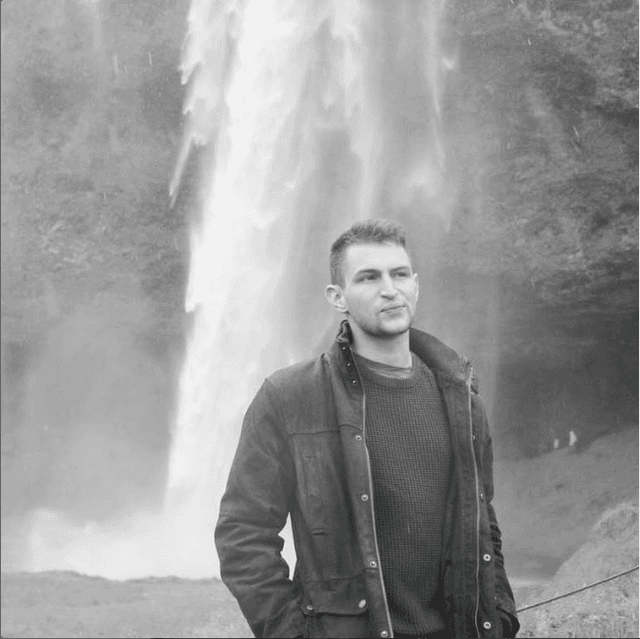 James Bush at a waterfall